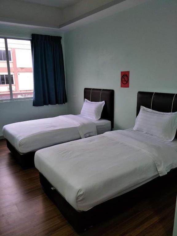 OYO 89855 Salim Room Sibu Exterior foto