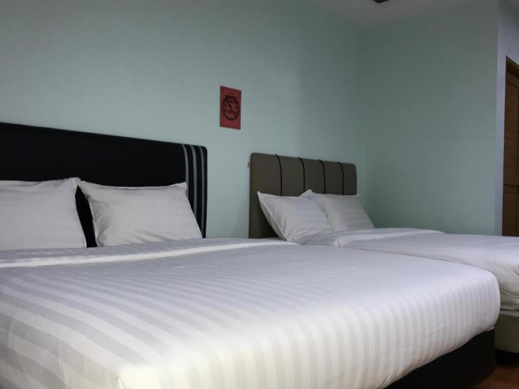 OYO 89855 Salim Room Sibu Exterior foto
