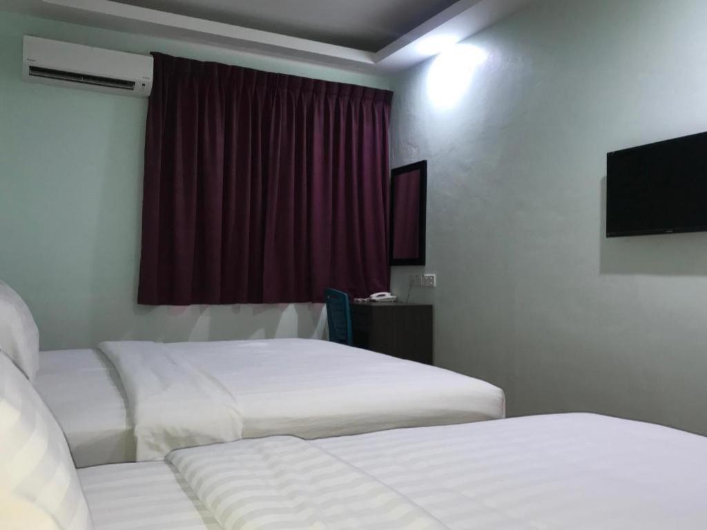OYO 89855 Salim Room Sibu Exterior foto